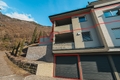 Ansicht Mehrfamilienhaus mit Markierung Wohnung und Garage - prospetto edificio con indicazione appartamento e garage